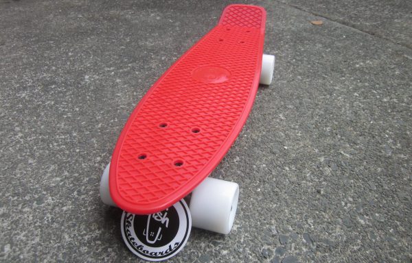 Red board with white wheels