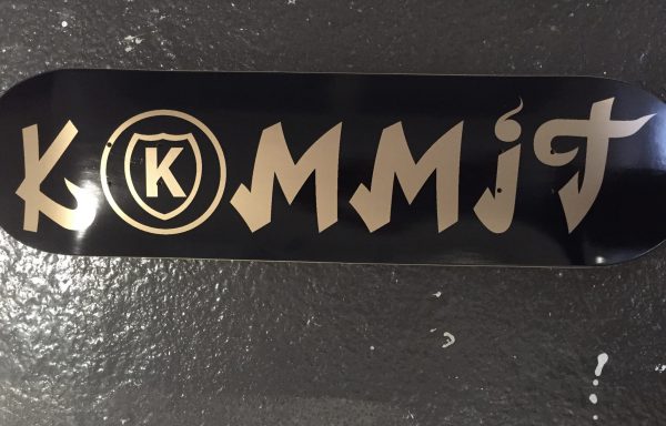 Kommit 8.00 inch black deck gold lettering